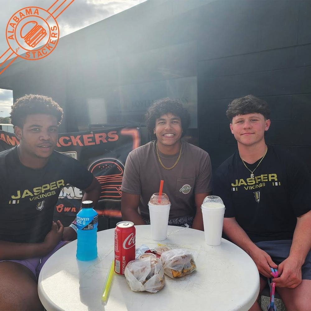 Friends with burgers outside