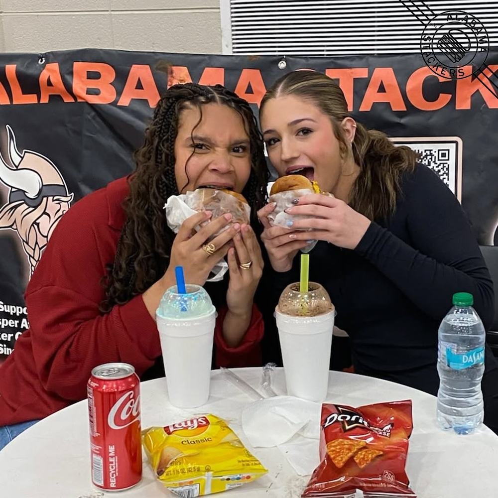 Friends taking a big bite