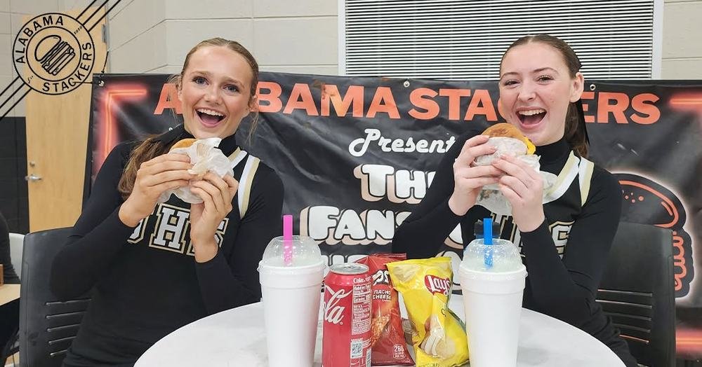 Cheerleaders with burgers