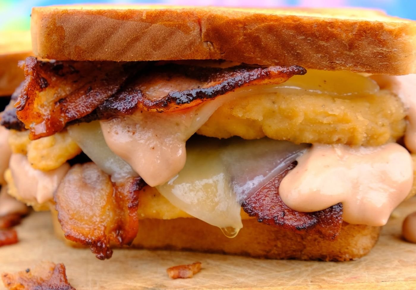 Chicken sandwich on toast with bacon, Monterey Jack and Stacker Sauce