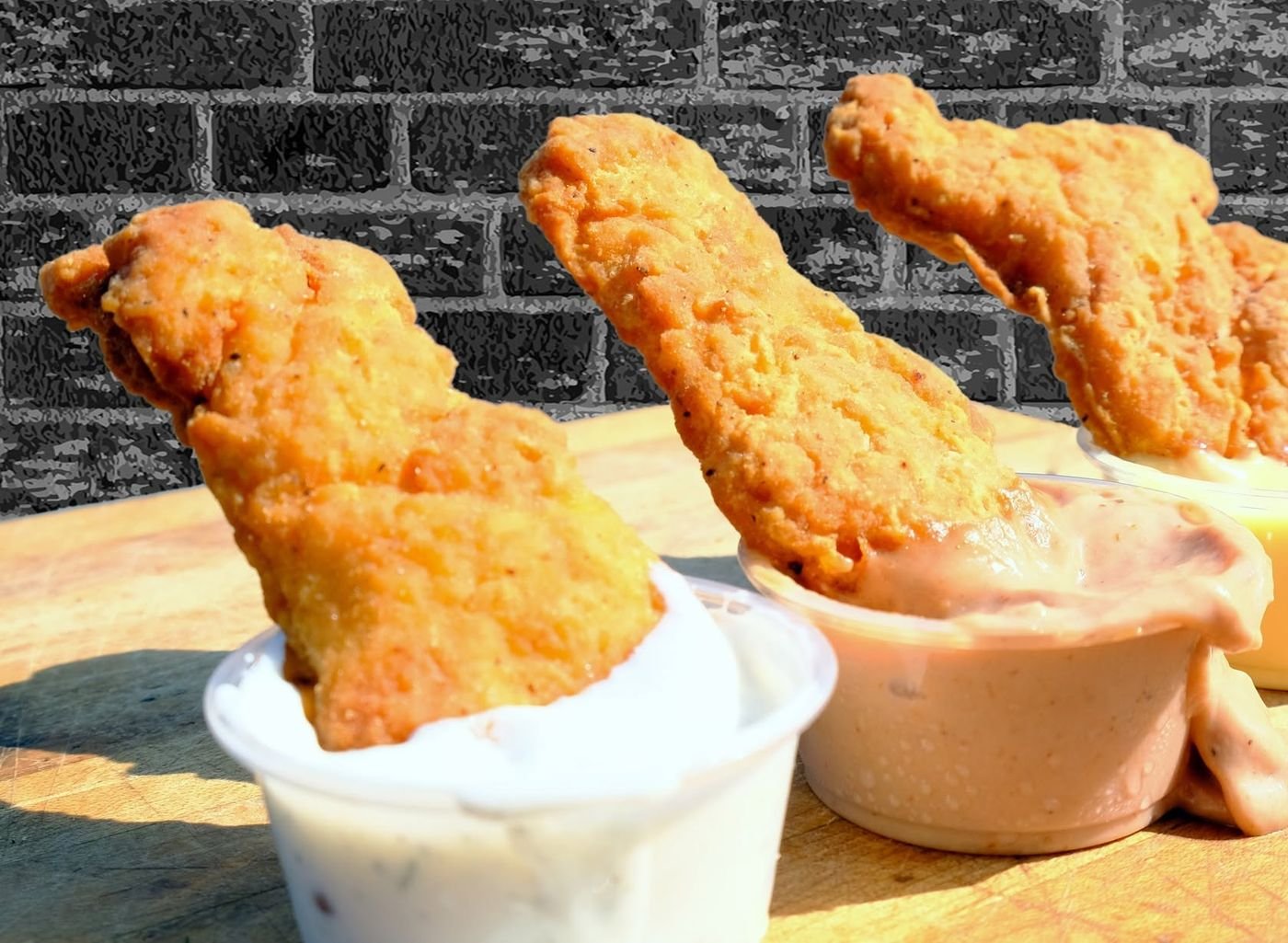 Fried chicken tenders with house-made dipping sauces